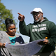 Kristi Williams, left, and Chief Egunwale Amusan view a cemetery map during a search for possible mass burial graves from Tulsa’s 1921 Race Massacre at Oaklawn Cemetery in Tulsa, Okla.